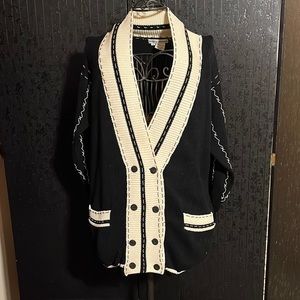 White trimmed black and white cardigan with pockets